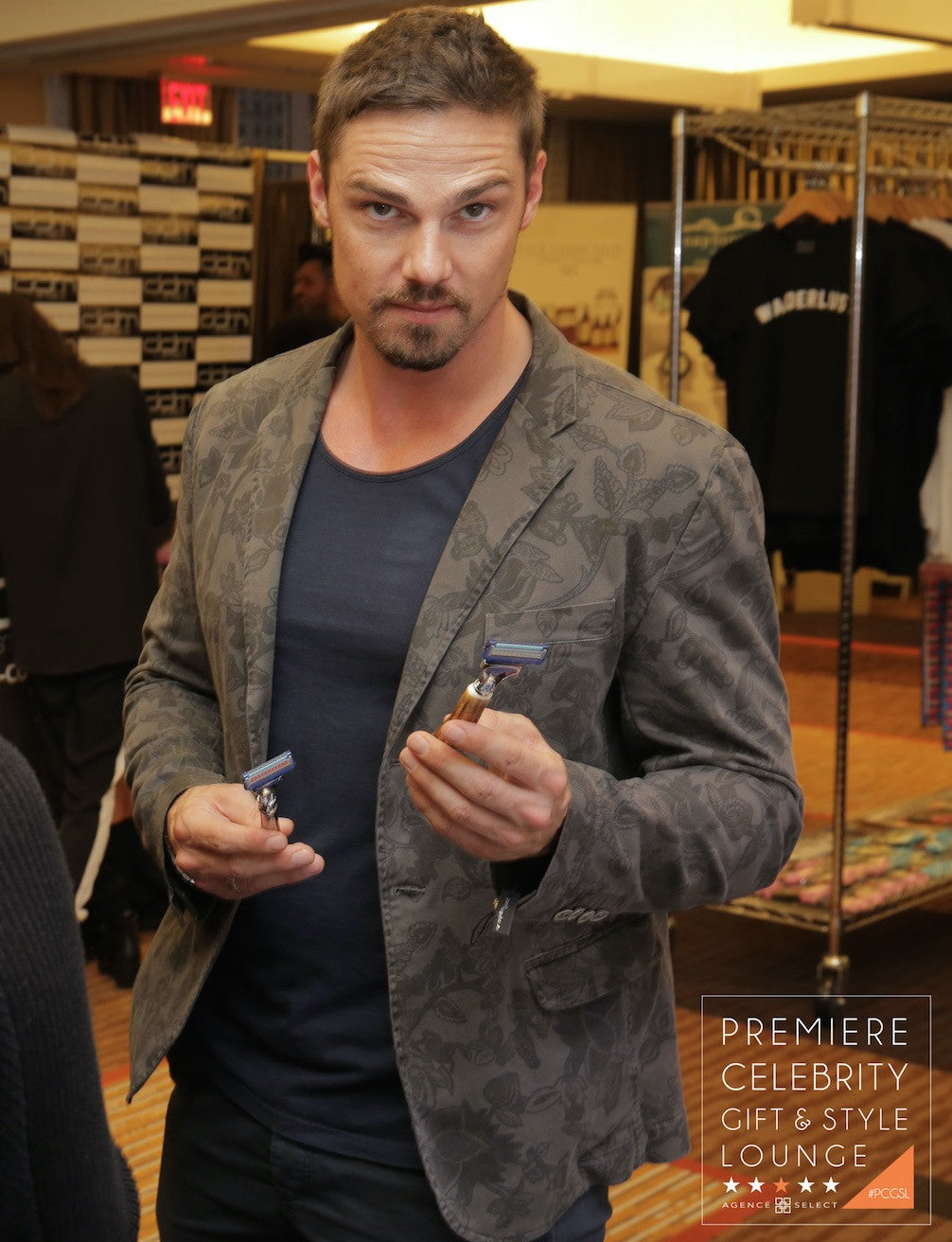 Celebrity Tom Hardy posing with a Kings Crown Shiny Nickel Safety Razor