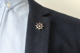 Silver Anchor Pin on Blue Jacket with a light blue dress shirt